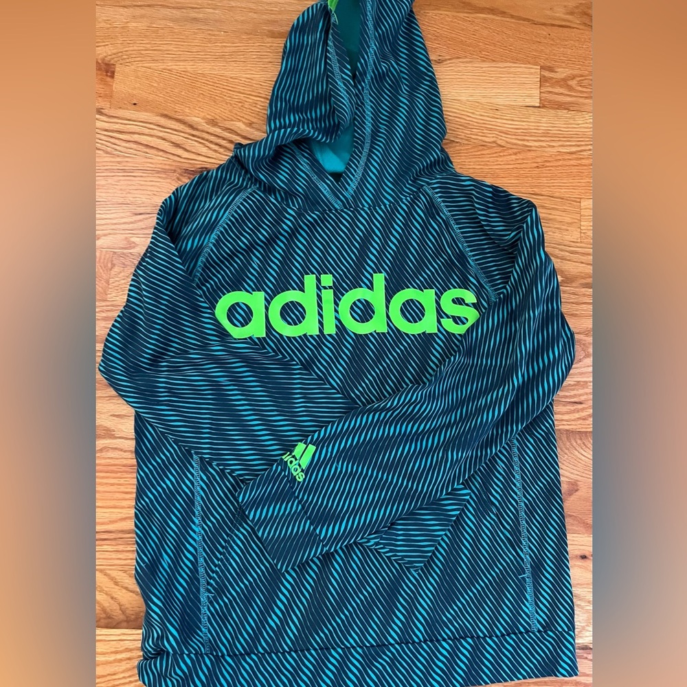 Adidas blue and black stripped hoodie with neon green lettering